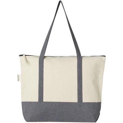 De Repose-draagtas met ritssluiting is gemaakt van eco-vriendelijk, pre-consumer gerecycled katoen van 320 g/m². Heeft een hoofdcompartiment met ritssluiting, trendy kleurblokken, steekvak aan de voorkant en handgrepen van 27 cm. Geschikt tot 10 kg gewicht.