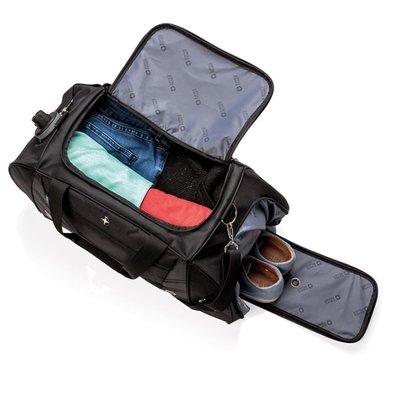 Deze 600D met 1680D polyester sporttas kan zowel worden gebruikt voor naar de sportschool als een weekendje weg. Ruim hoofdvak met een U-vormige top ritssluiting. Geventileerd en geïntegreerd schoenenvak. Speciaal vak voor een sportfles. Voorzijde voorzien van quick-stash vak voor smartphones en andere reis accessoires.Verstelbare schouderband met beweegbare pad. Dubbele draagriemen met gevoerde grip. PVC vrij.
